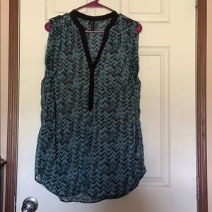 Sleeveless sheer tunic